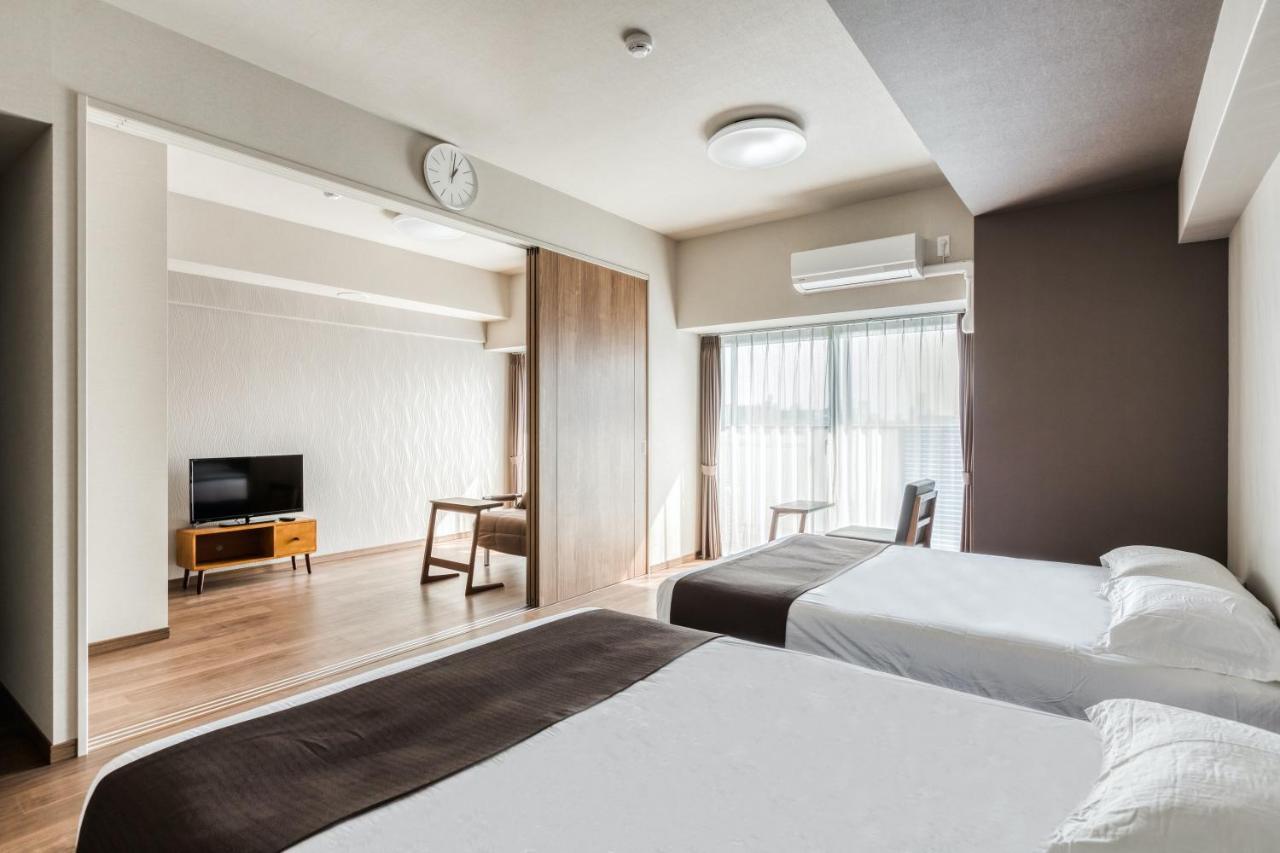 Ostay Shin-Osaka Hotel Apartment Bagian luar foto